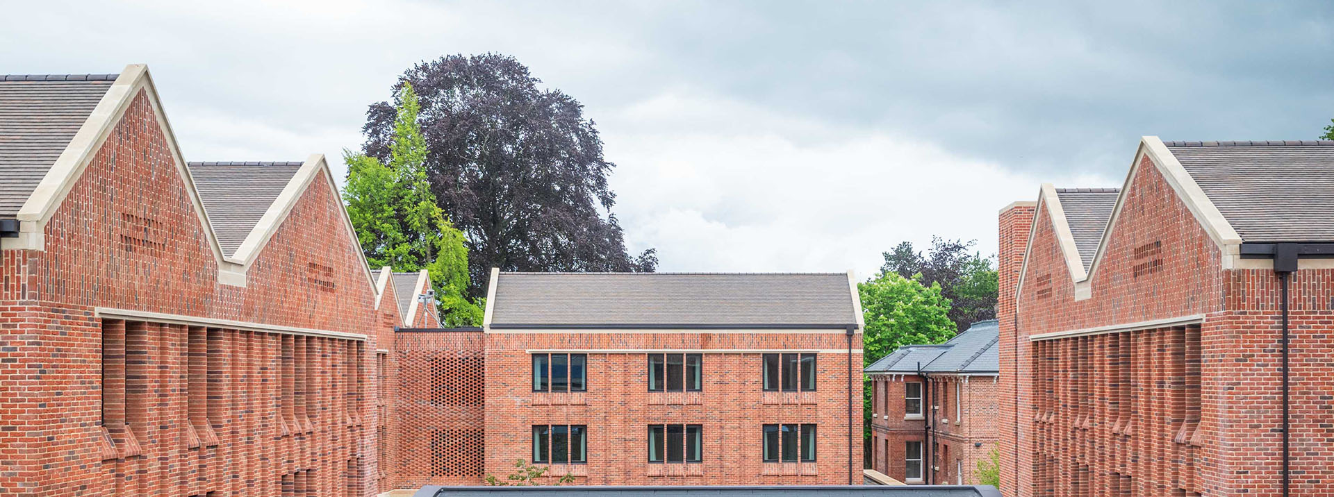 brown heather rustic tiles at new boarding houses Winchester College
